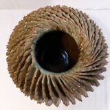 ball vase with twisted fins
