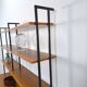 Modulair Omnia wandsysteem, Hilker, teak en zwart staal met legplanken