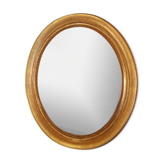 Miroir ovale Louis XVI 19 eme à la feuille d’or restauré 77x90cm