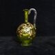 Small carafe and green glass drop glasses with rococo golden emailed decor