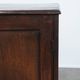 Charming and timeless antique English oak cabinet/commode from the early 19th century with two doors and a working lock