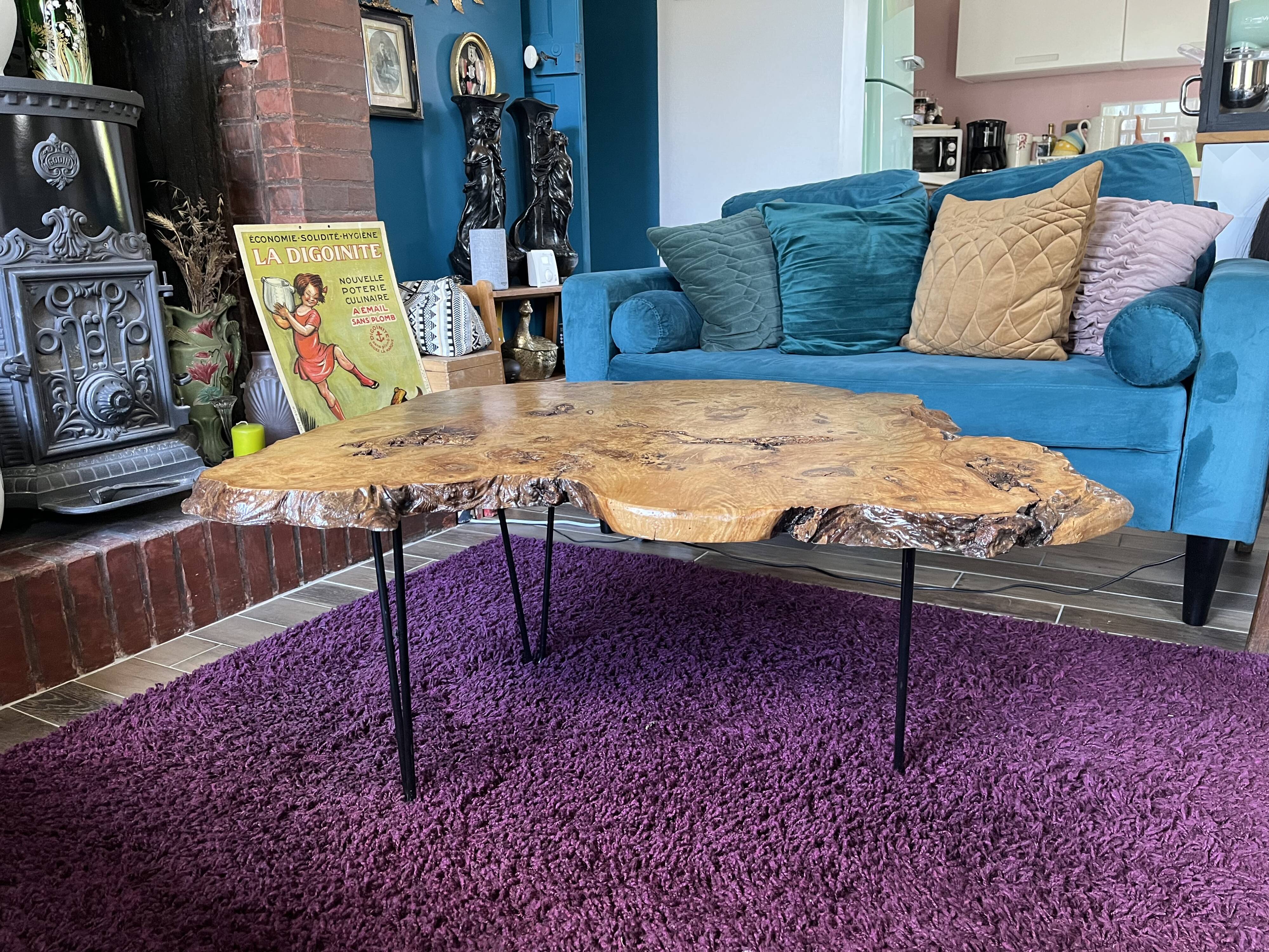 Tripod coffee table in natural solid elm magnifying glass