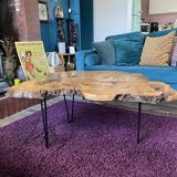 Tripod coffee table in natural solid elm magnifying glass