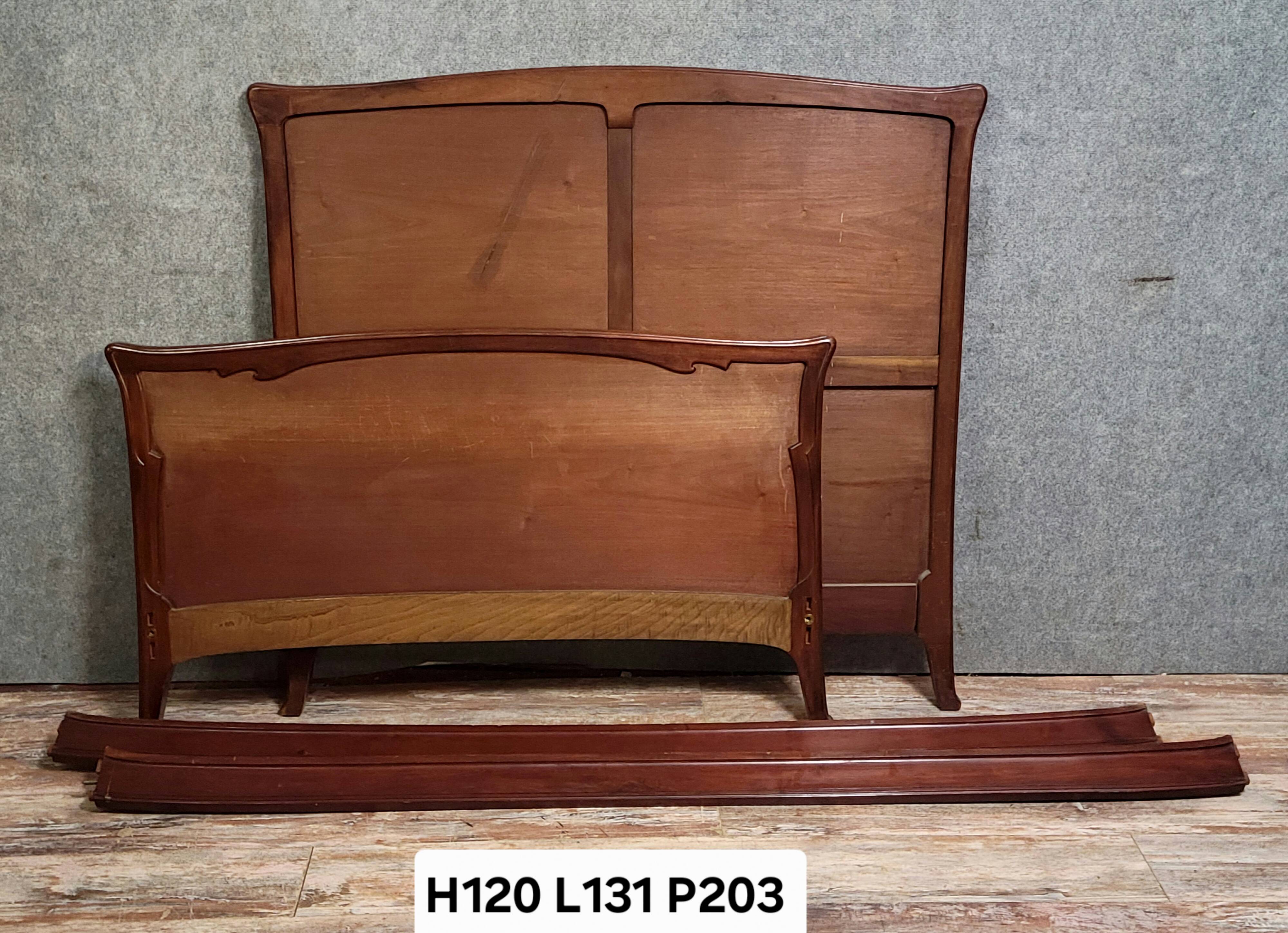 Nancy School: Art Nouveau style bed, characterized by its curved lines