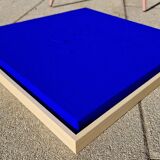 Framed monochrome blue abstract painting.