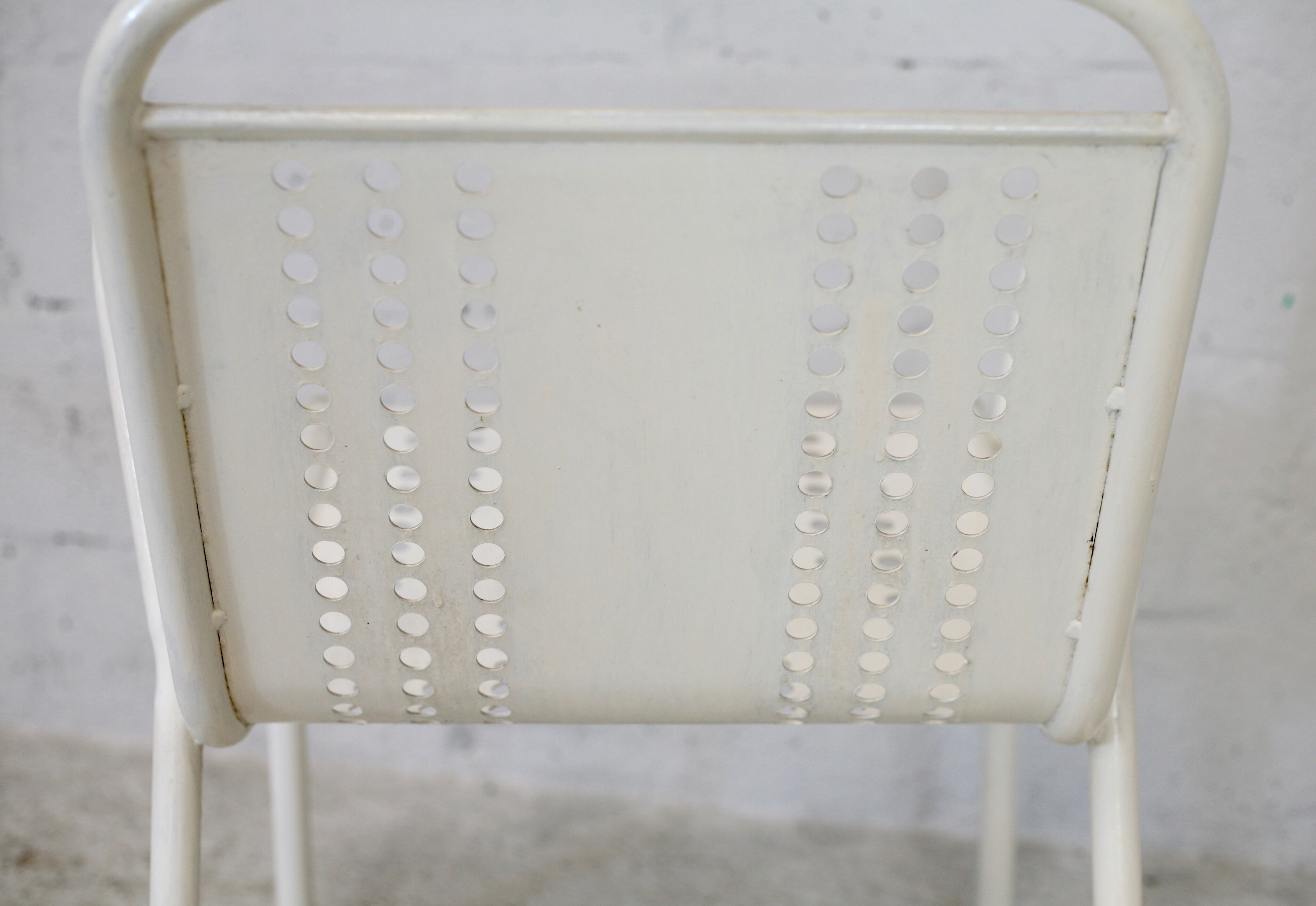 Pair of honeycomb steel armchairs. France, circa 1950.