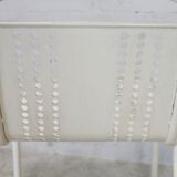 Pair of honeycomb steel armchairs. France, circa 1950.