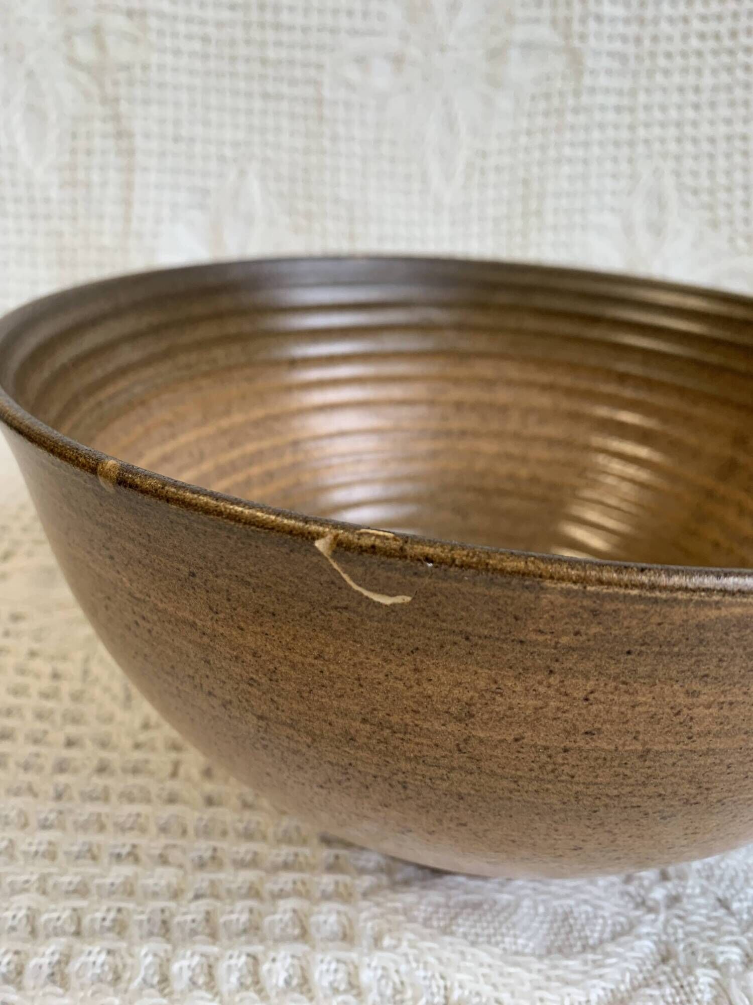 Large Longchamp glazed stoneware salad bowl, dating from the 1970s, in brown tones