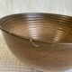Large Longchamp glazed stoneware salad bowl, dating from the 1970s, in brown tones
