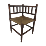 Corner chair in turned wood and straw