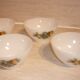 White glass Arcopal bowls with vintage fruit décor