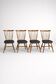 Set of 4 Baumann "Menuet" chairs – stained beech and black faux leather – French design