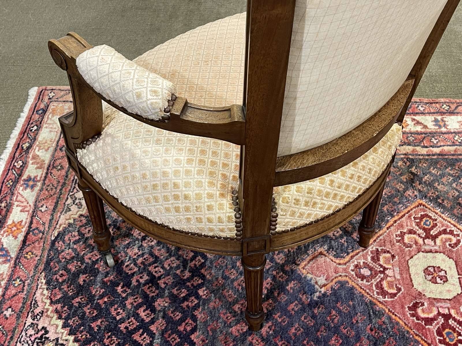 Pair of early 20th century Louis XVI armchairs in walnut