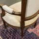 Paire de fauteuils Louis XVI début XXème en noyer