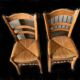 Four old straw chairs