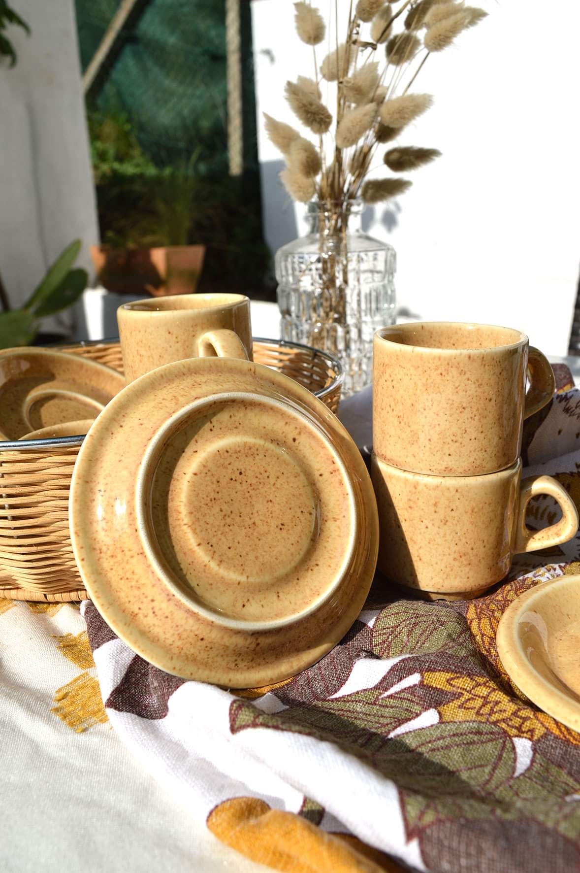 Series of 6 sandstone cups and saucers