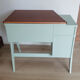 Bureau en bois vintage années 50 vert d'eau pieds compas