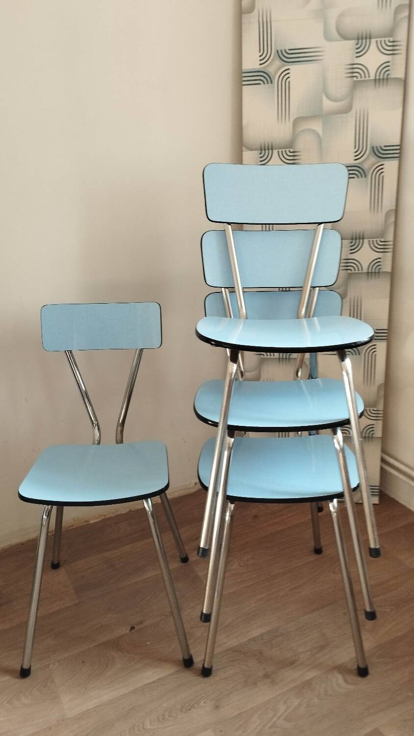 4 blue Formica chairs