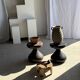 Small low circular four-legged stool in organic old teak with cut-out design H2