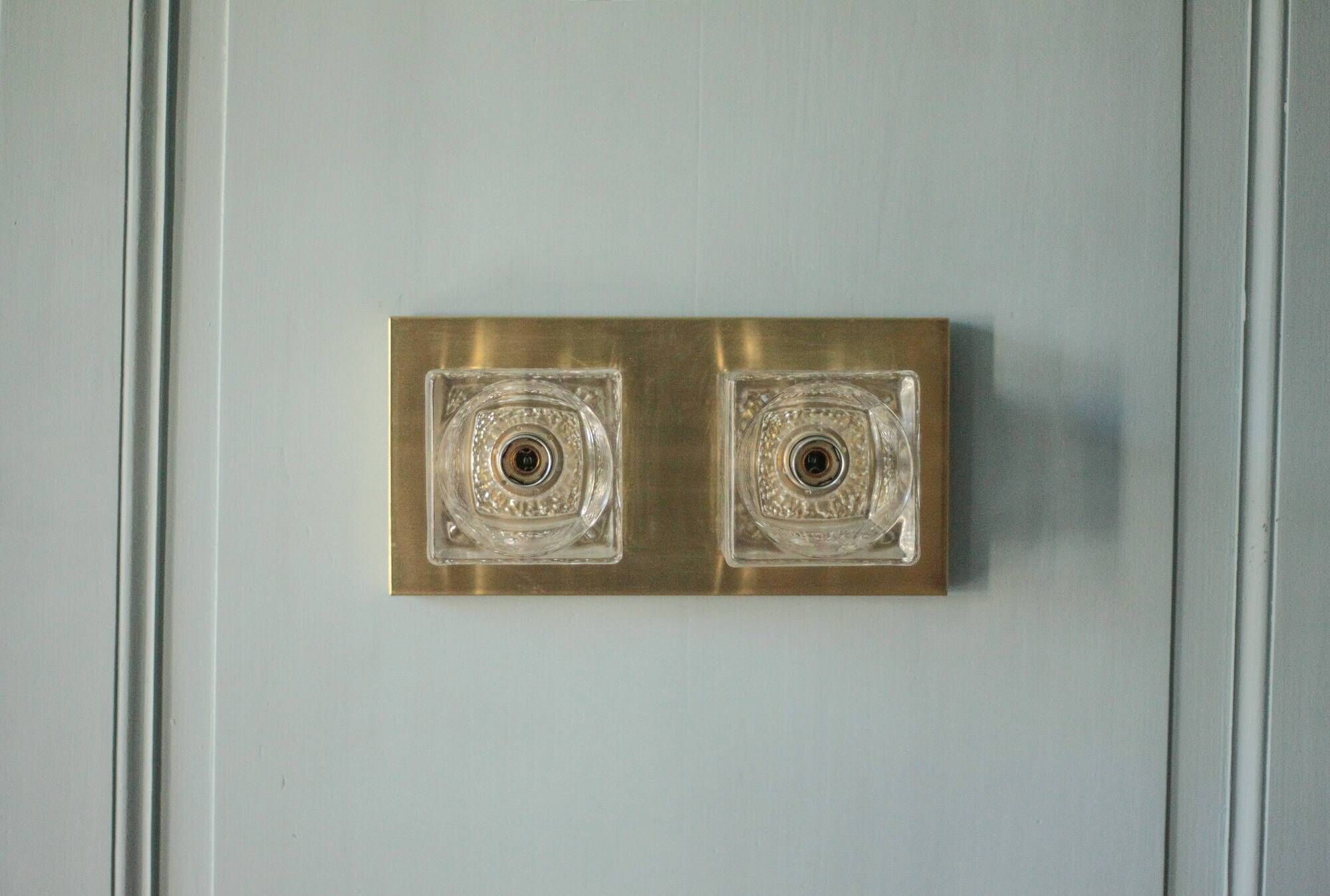 Peill & Putzler wall light, vintage, brass and thick glass wall sconce.