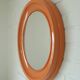 Orange vintage round wall plastic mirror 1980s, space age vanity mirror