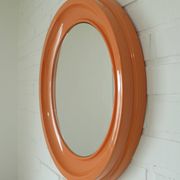 Orange vintage round wall plastic mirror 1980s, space age vanity mirror