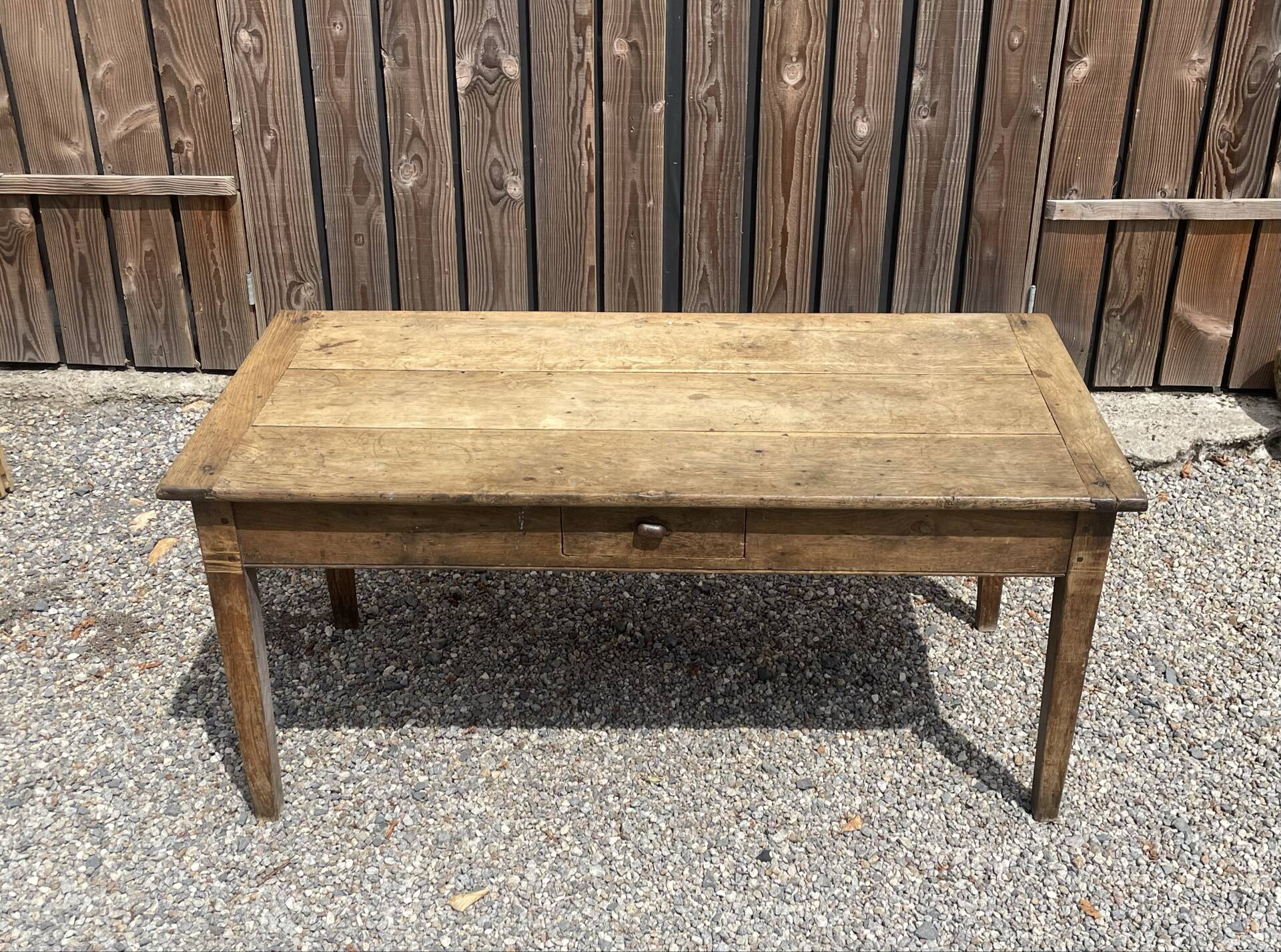 Solid oak farmhouse table with 2 drawers.