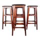 4 Danish high stools, rosewood and black leather, Knud Bent for Dyrlund.