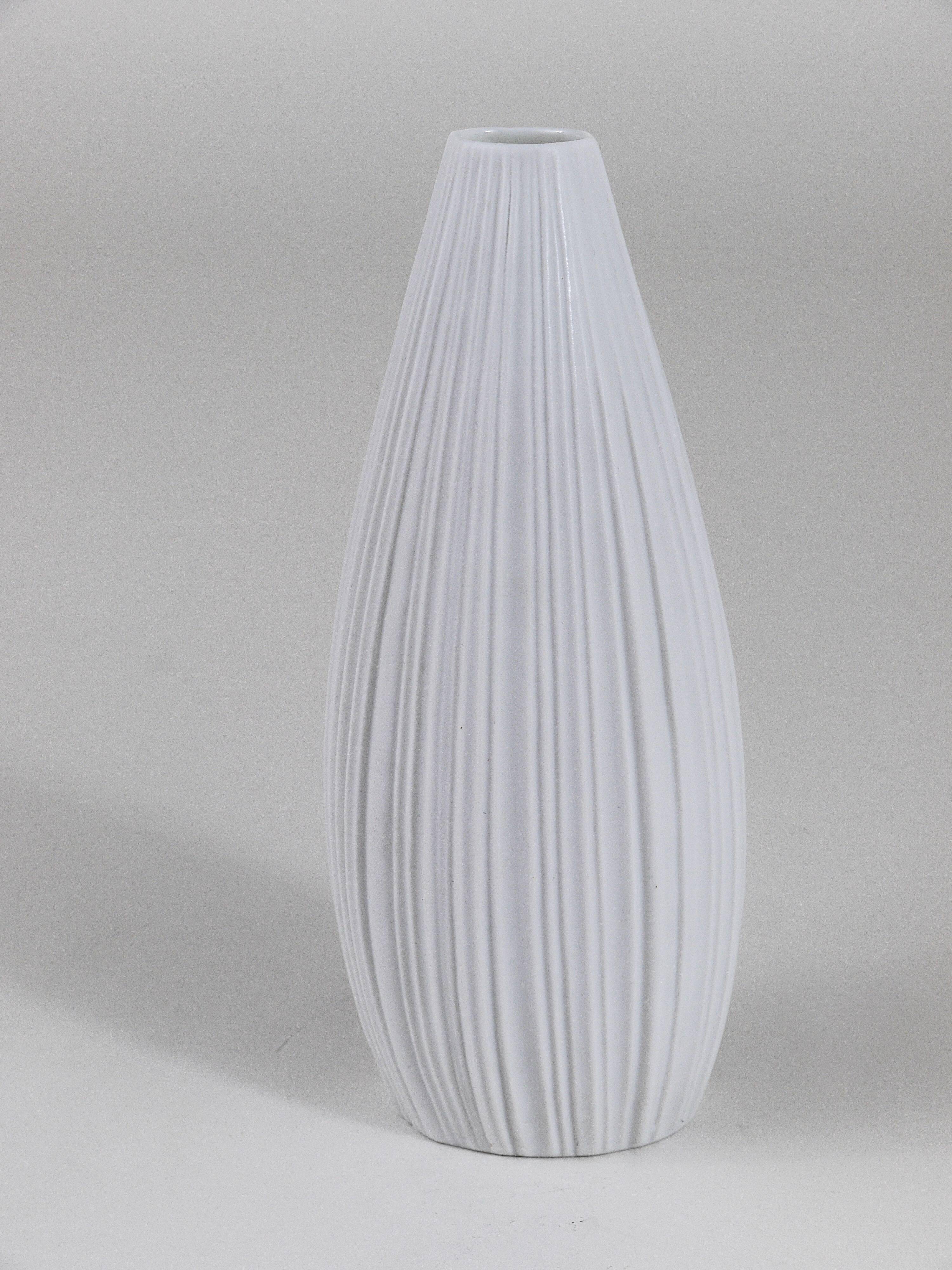 White porcelain vase with striped relief by Rosenthal, designed by Martin Freyer, Germany, 1960s.
