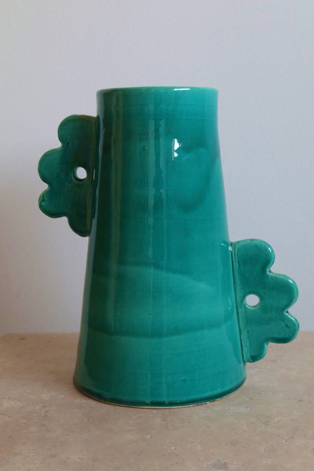 Handmade ceramic abstract vase with large handles and turquoise blue flowers