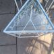 3 nesting tables in white wrought iron. Beveled glass.