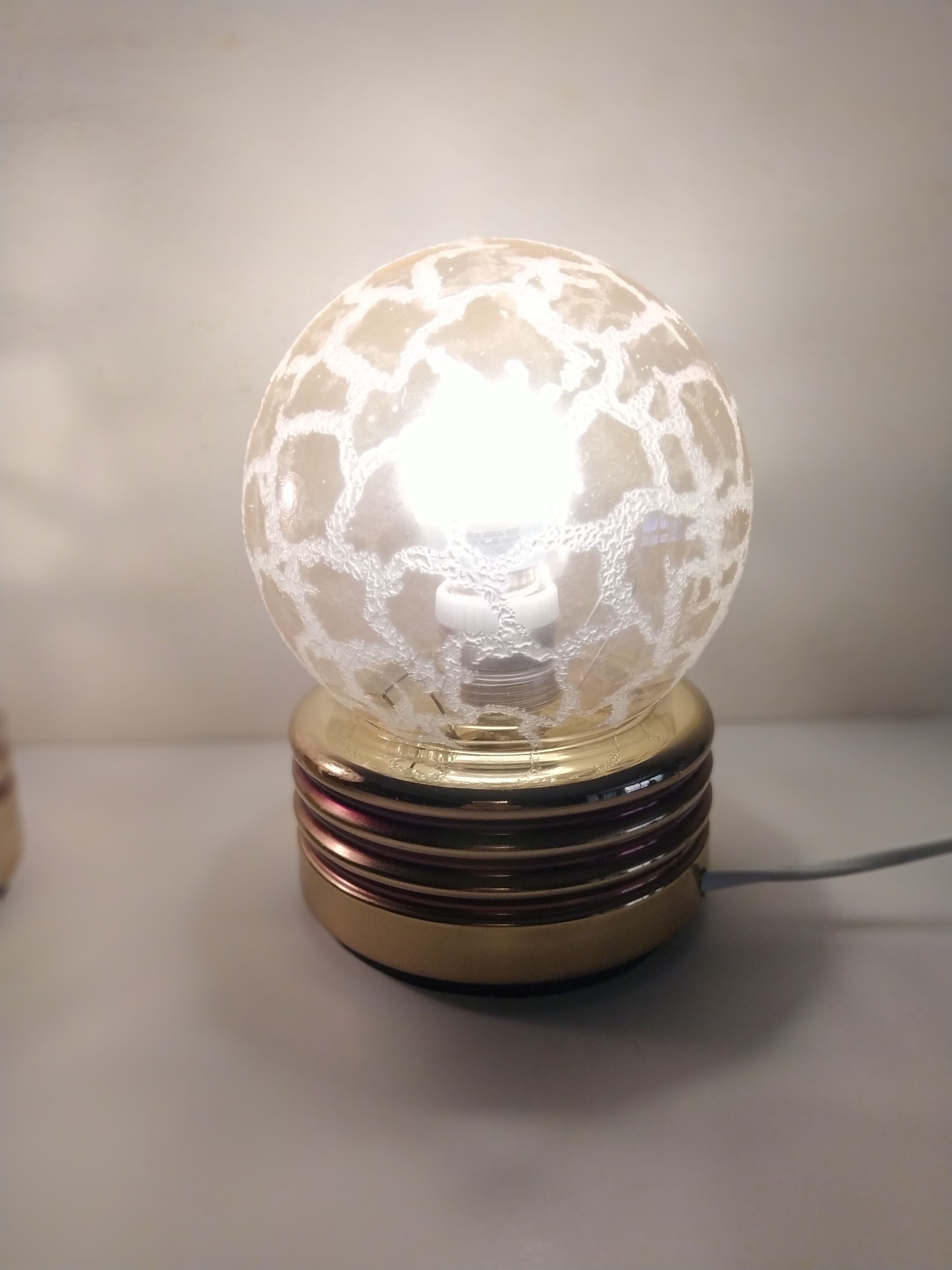 Pair of golden bedside lamps