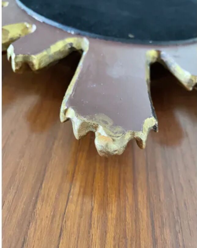 Vintage sun mirror in golden resin 60s/70s