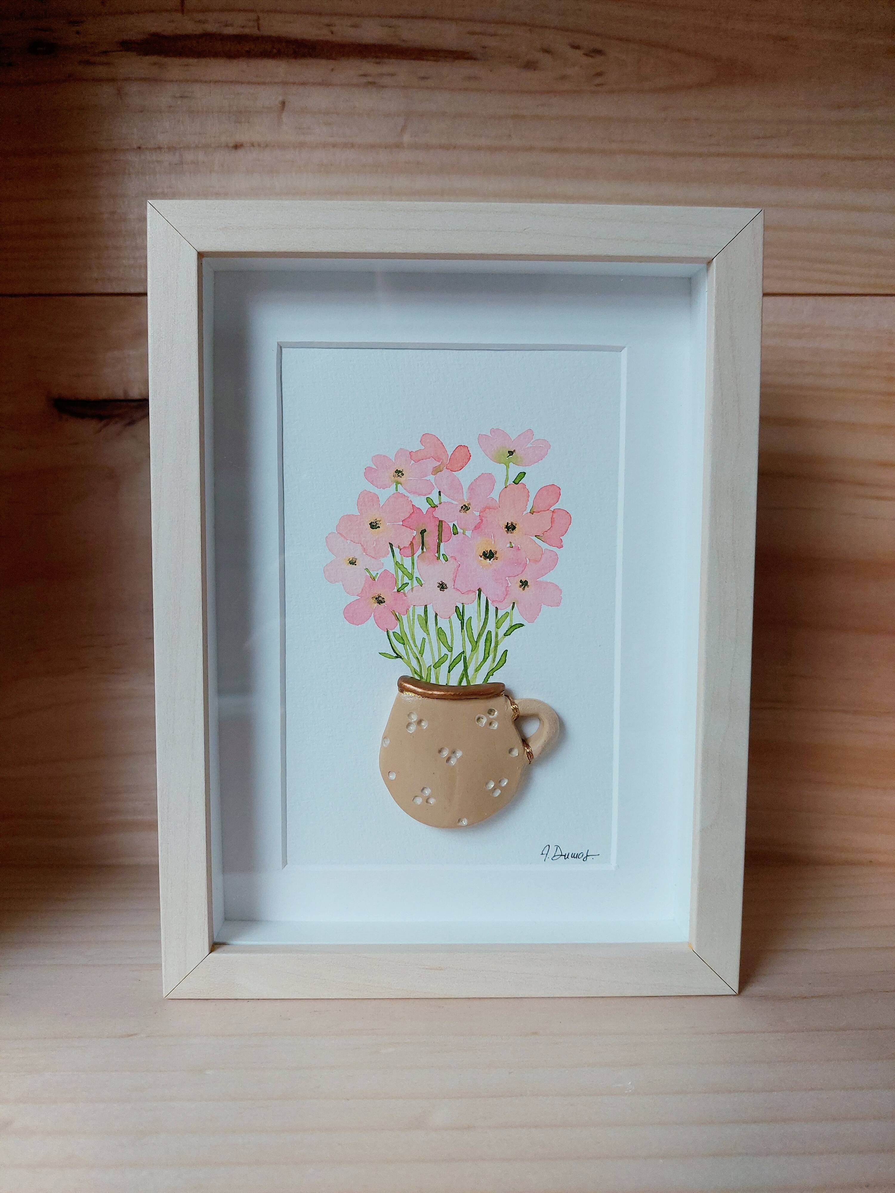 Relief painting bouquet of pink flowers in watercolor in a handmade clay mug