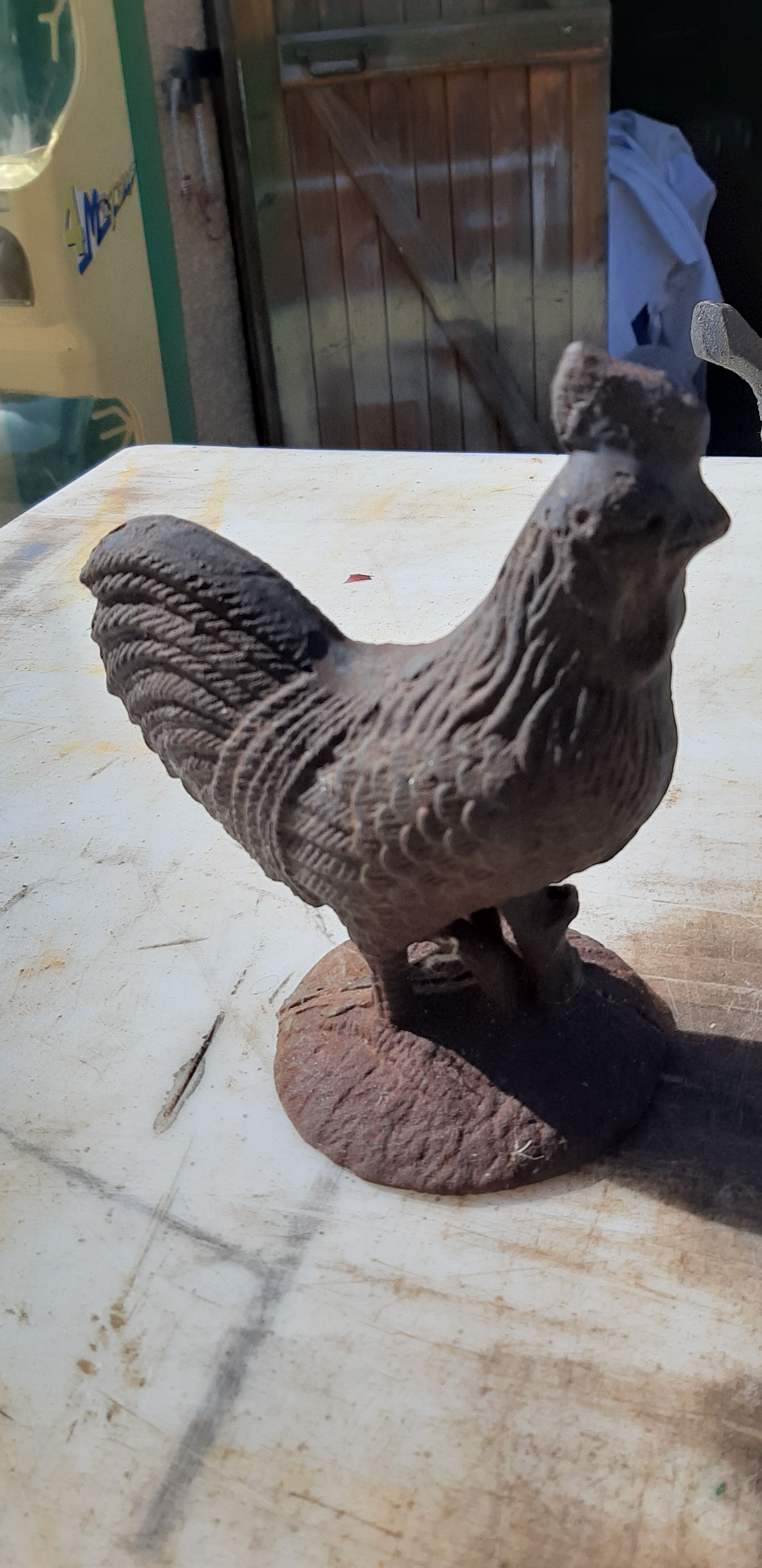 2 roosters and 2 cast iron birds