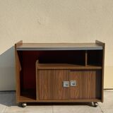 Meuble bar années 70 brun à fond orange sur roulettes