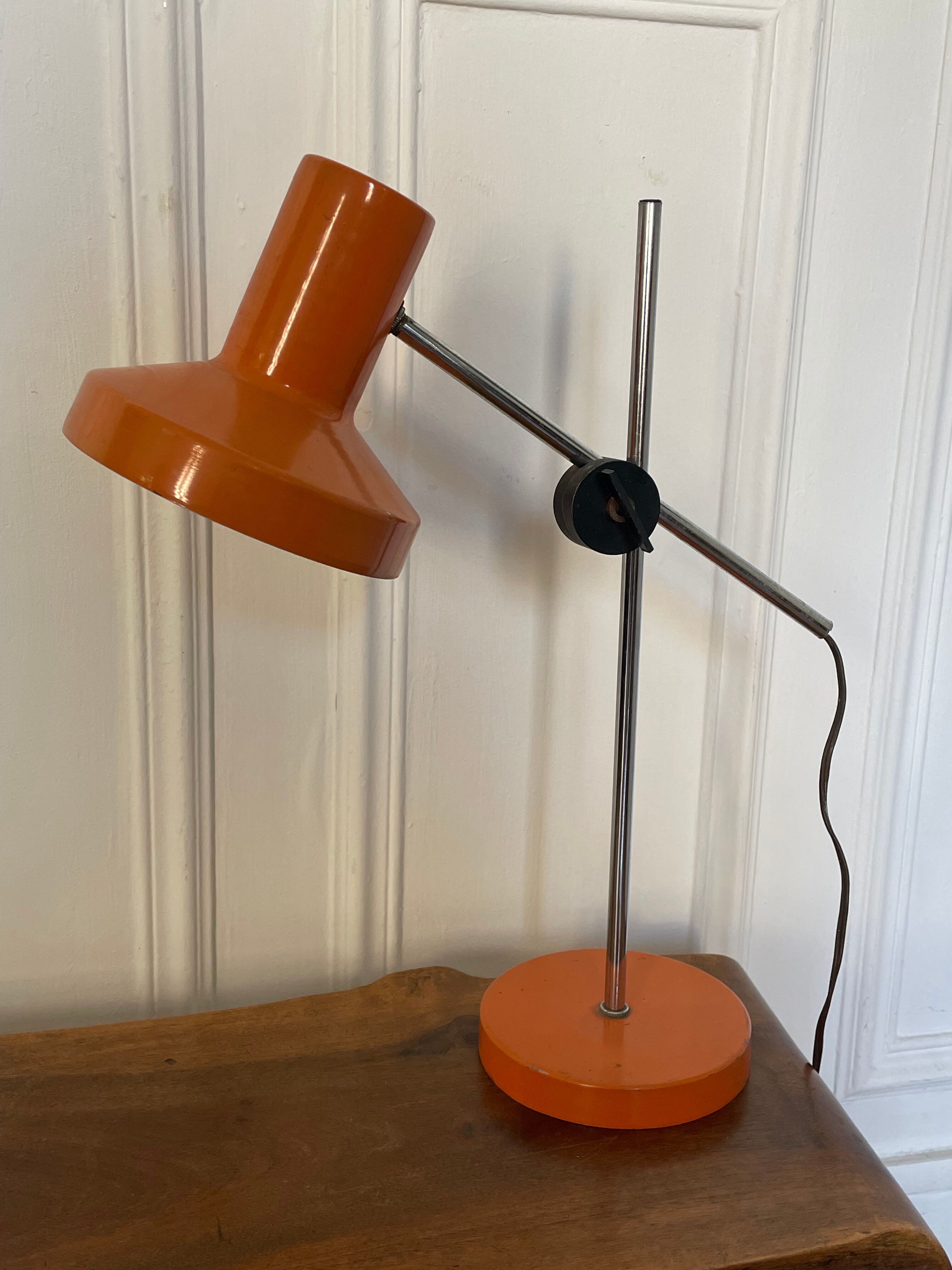 Orange articulated lamp design 1970