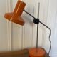 Orange articulated lamp design 1970
