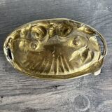 Art Nouveau pocket emptier