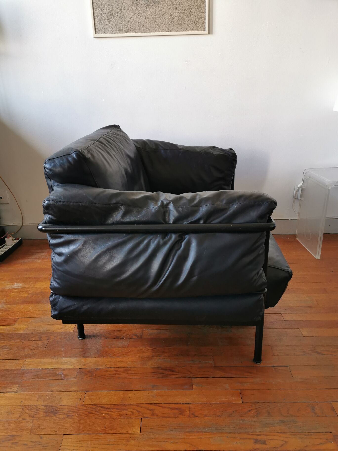 Black leather armchair circa 1970