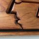 Bas relief cadre bois motifs visages