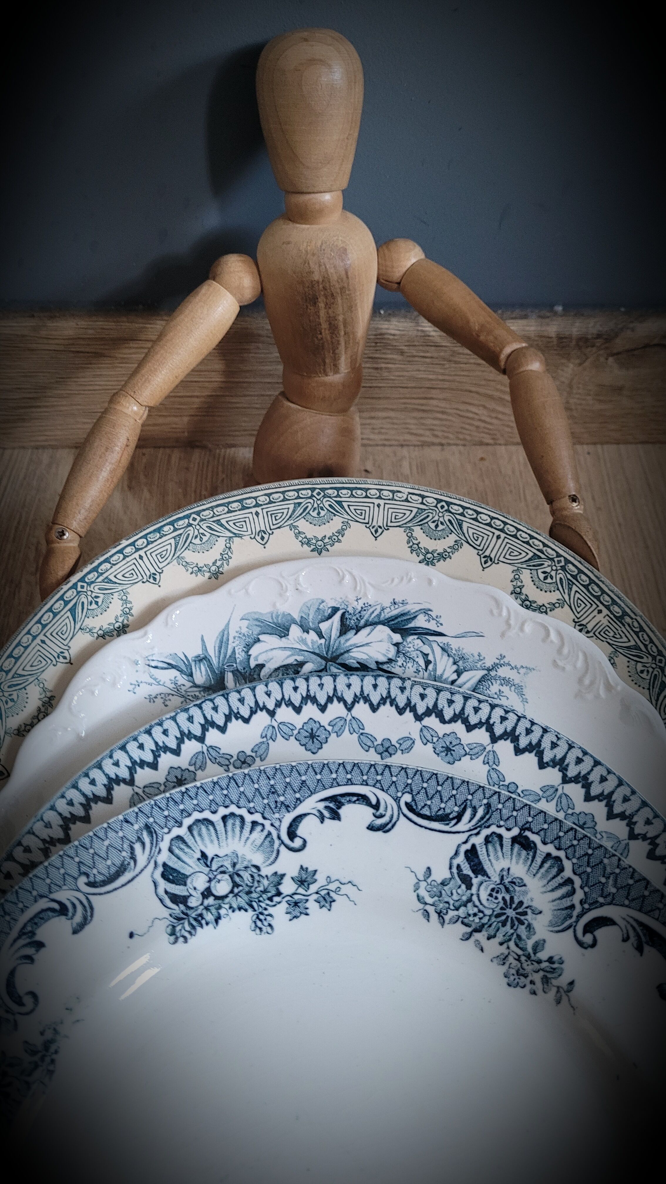 Quartet of mismatched blue plates