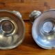 Pair of old Chinese candlesticks in engraved pewter