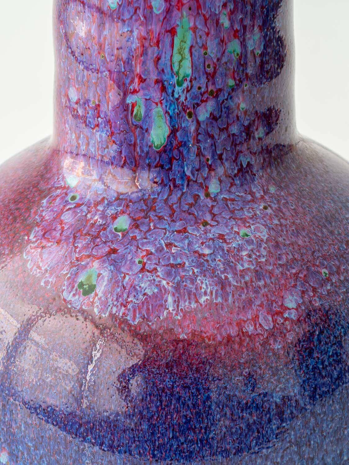 Mid-century modern table lamp by Jaap Ravelli, ceramic base and glass shade.