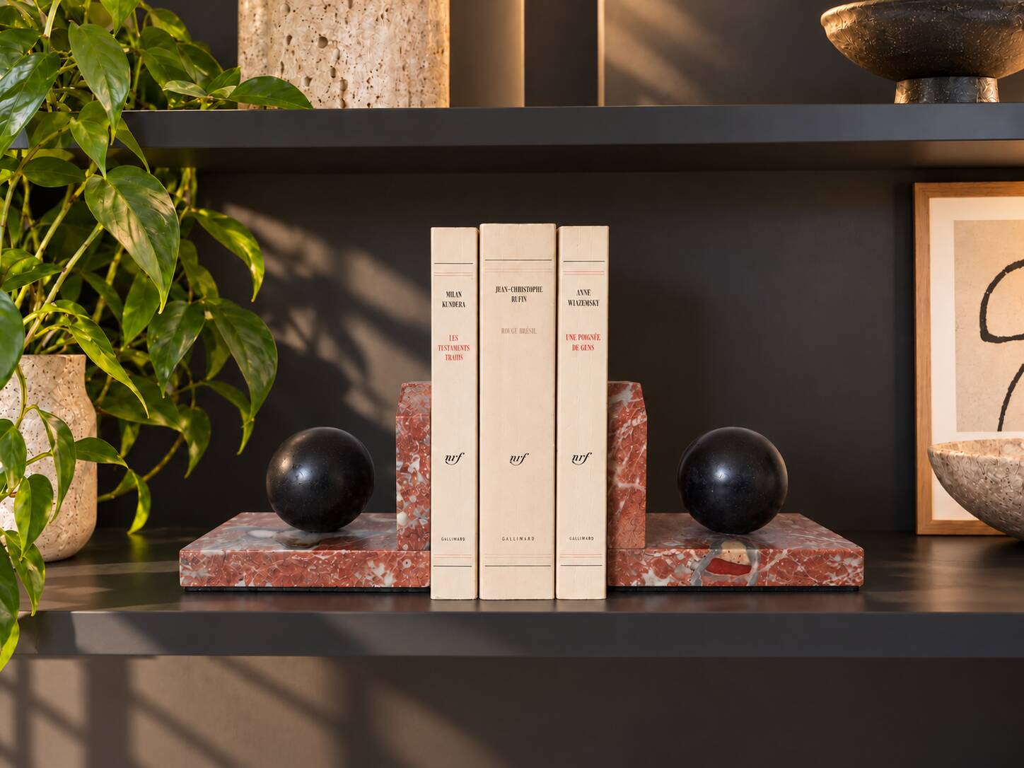 Pair of red marble bookends with black stone spheres – Art Style
