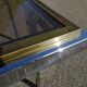 Chrome and golden brass console 70s