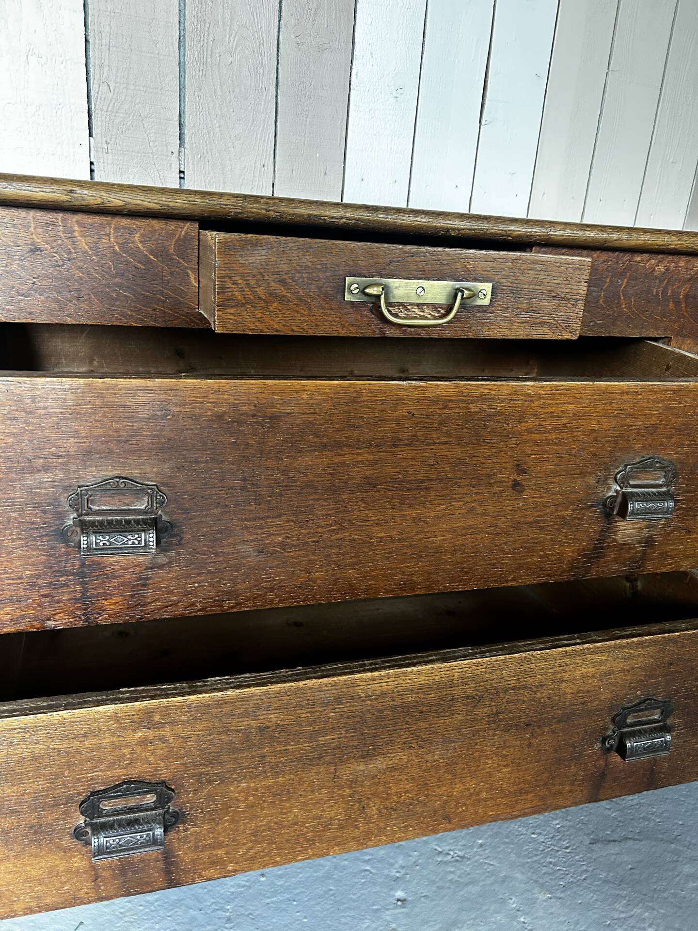 Large antique haberdashery counter in oak