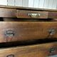 Large antique haberdashery counter in oak