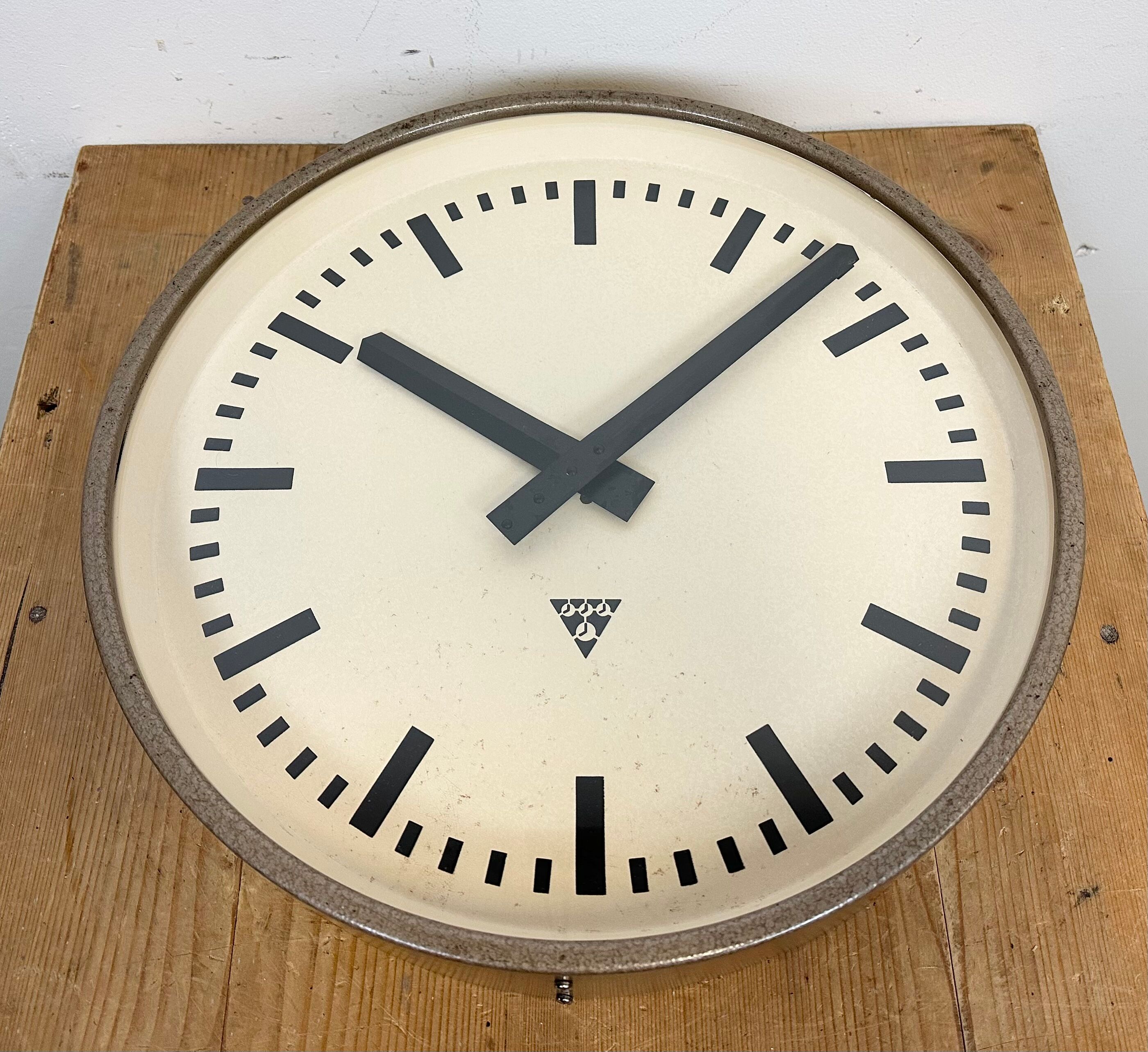 Brown industrial factory wall clock from Pragotron, 1960s