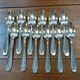 Set of 12 small silver-plated spoons in their box.